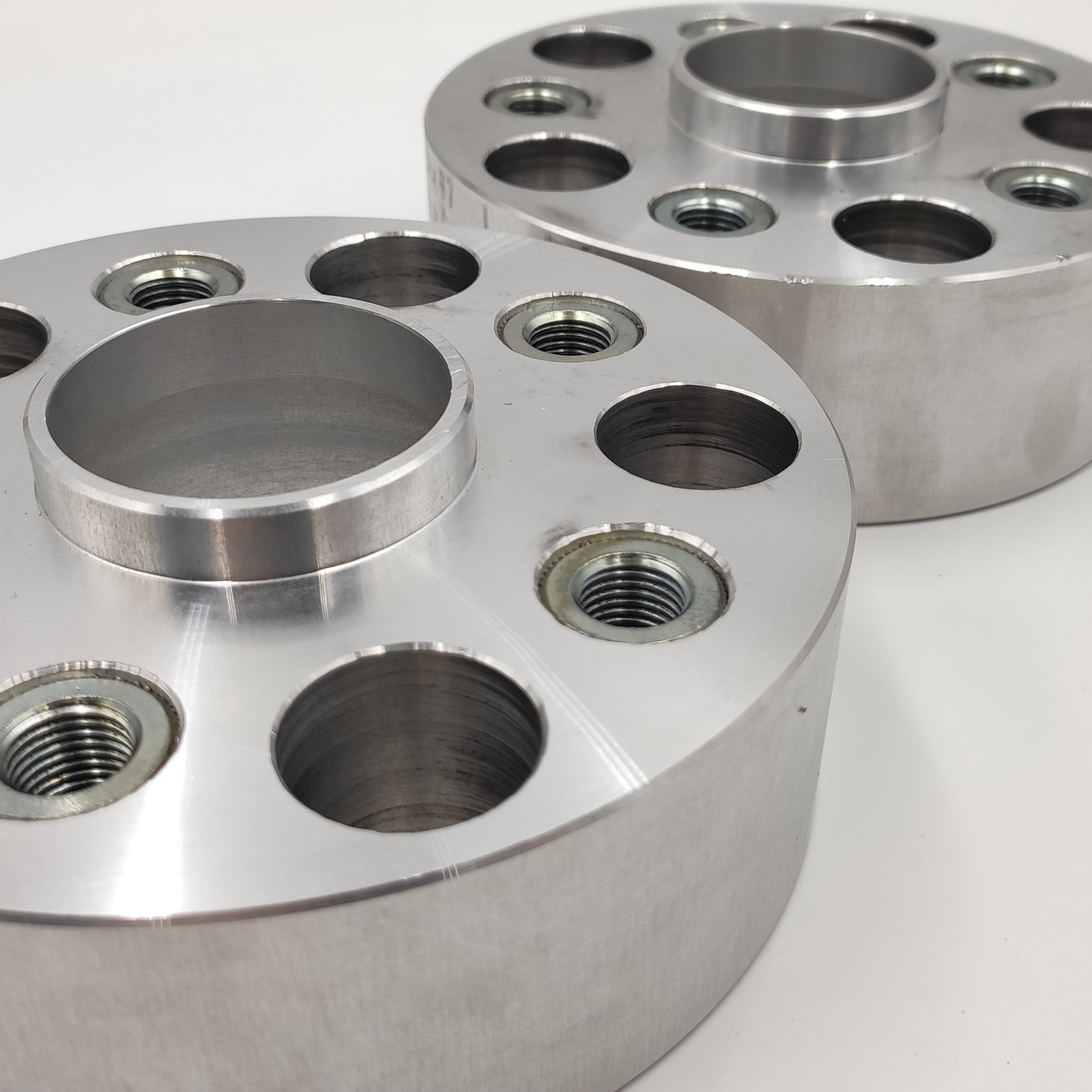 AKCE: Podložky - změna rozteče 5x118-5x112, střed 71, šíře 50mm, vlis. závit. pouzdra M14x1,5